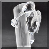 C25. Swarovski Crystal woodpeckers figurine. 